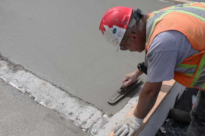 Hand screeding Helix reinforced slab